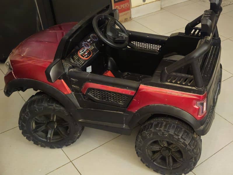 kids electric toy car ride 4x4 heavy duty motor 0