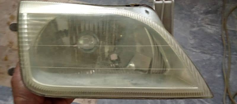 headlight cultus right side for urgent sale no damage no cutting 3