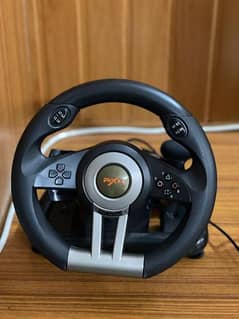 PXN V3 STEERING WHEEL IN NEW CONDITION APPLICABLE TO XBOX,PS AND PC