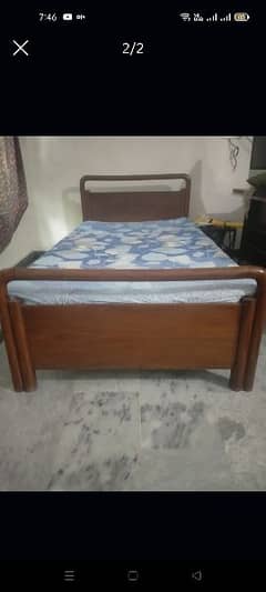 2 single beds with mattress