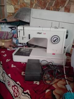 swing and embroidery machine