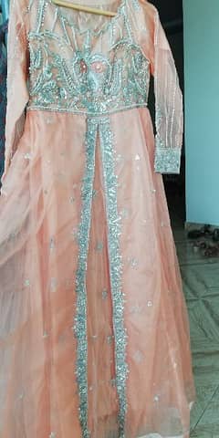 Peach color Gorgeous Front open Maxi for party wear.