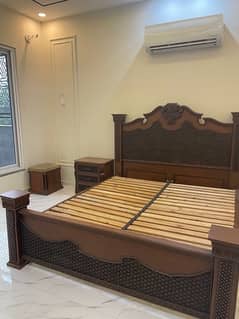 solid wood   bed with cane