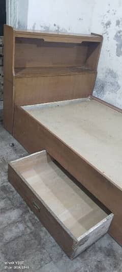 solid wooden single bed or side table