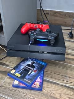 PS4 Original with 2 Original Controllers and 2 games