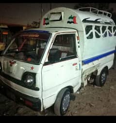 Suzuki ravi 2009 with 12 seater hood best for school or pick and drop