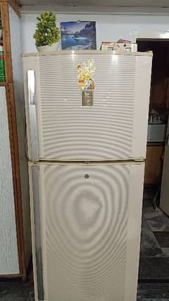 Dawlance Refrigerator with Voltage Stabilizer and Wooden Stand