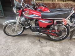 Honda 125 in lush condition