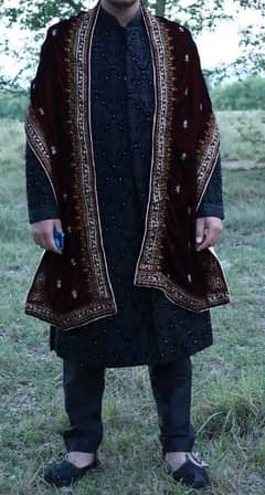 sherwani with black ghoosy with red kula