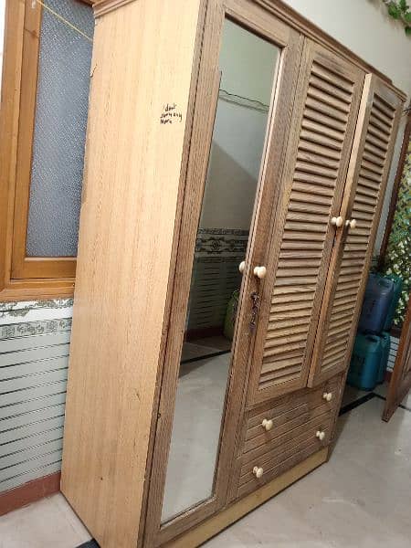 3 door cupboard good condition 1