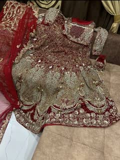 Heavy bridal dress urgent sale