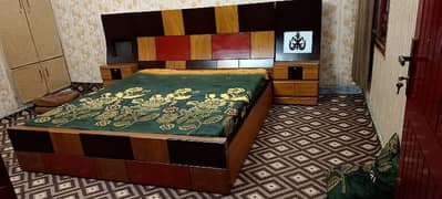 king size bed with side tables and dressing