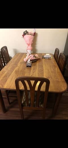 pure wooden dining table with 8 chairs