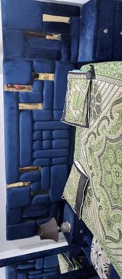 Beautiful blue velvet bed with rolling miror