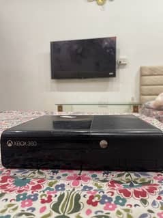 Xbox 360 live with all accessories and with 8 games only in 25000 0