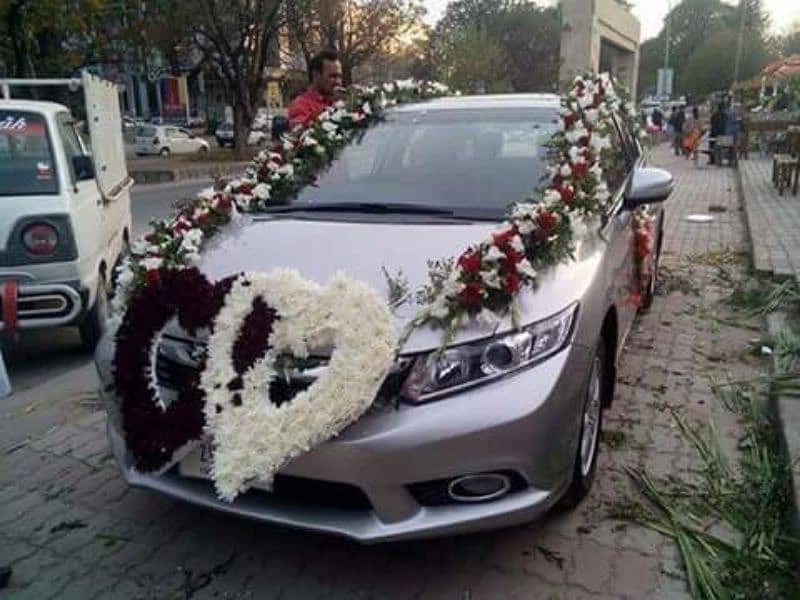 Decore room and cars from fresh flowers and artificial flowers 4