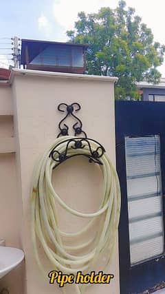 garden pipe holder . . . .