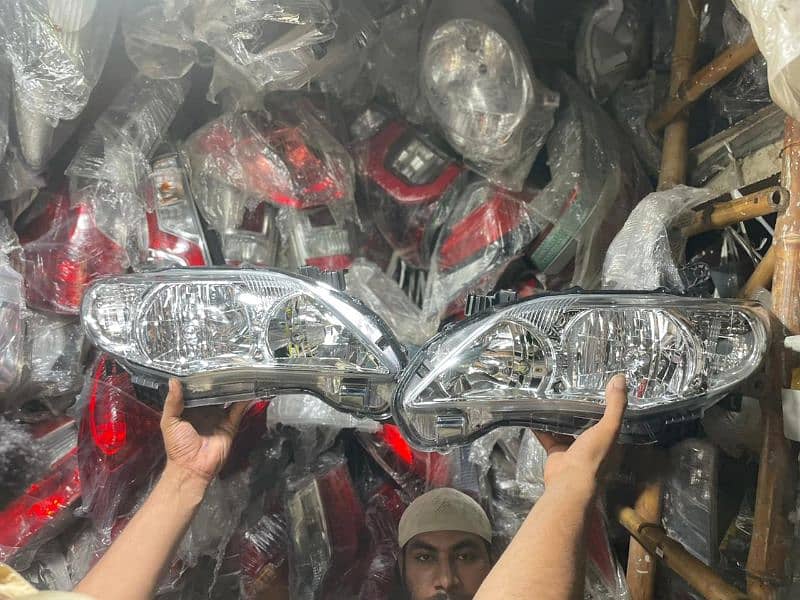 Toyota Corolla 2012-14 Xli Gli Head lights Tail lights Side Mirrors 1