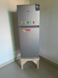10 days used Fridge Haier Model 186 with free stool cost RS 2000/-