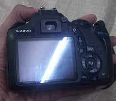 Canon Eos2000d with basic and 75-300mm lens and two bags