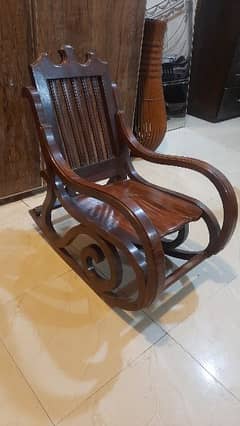 antique rocking chair in fine wood for children