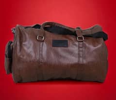 textured brown duffle bag