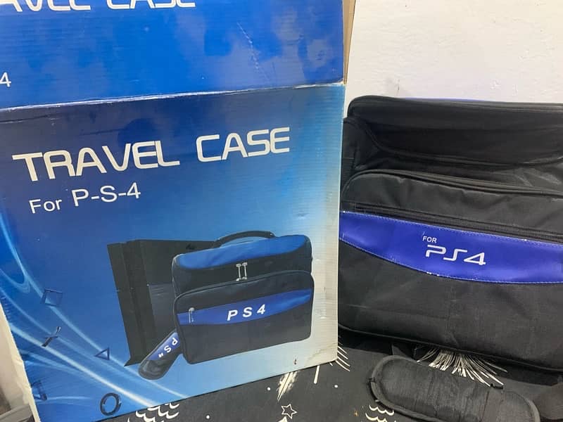 PS4 fat 500 GB with travel case and 2 controllers 5