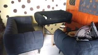 6 seater sofa black velvet with a marbel table