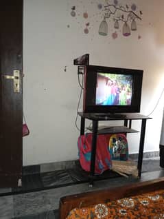 urgent sale tcl nobel tv with troly