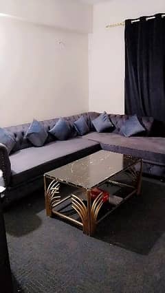 L shaped sofa and centre table