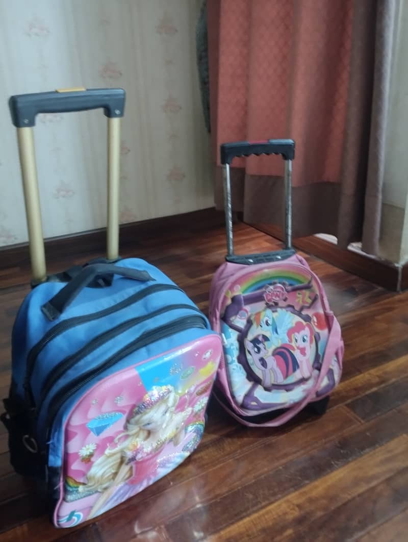 Two trolly school bags are available for sale 8