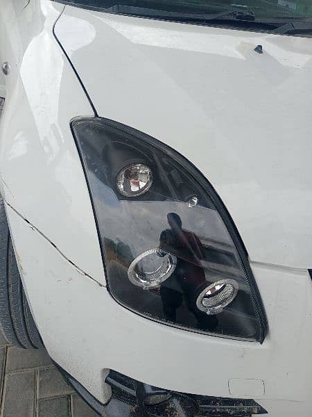 SWIFT SPORTS HEADLIGHTS. SWIFT GT LIGHTS. IMPORTED 4