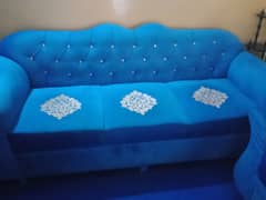 Blue velvet sofa