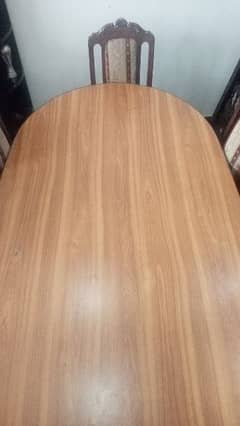 pure wooden table with 8 chairs