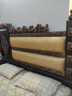 king size bed with side tables and dressing table.