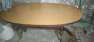 Dinning Table (oval shaped) with 6 chairs for sale.