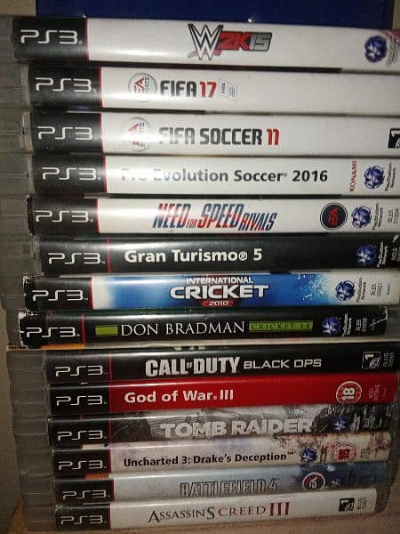 PS3  and games cds . 3