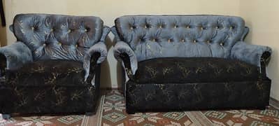 4 seater new sofa in black and grey combination is for sale