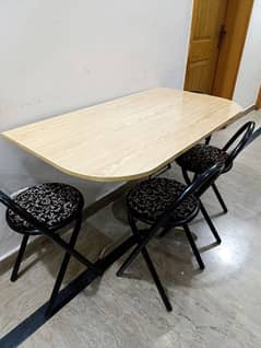 For Sale: Stylish and Compact Dining Table Set