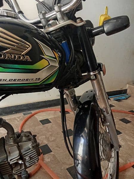 Honda cd70 2023 ky first month ki hy 6