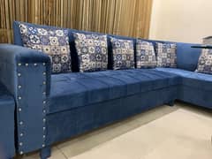 Lshaped sofa with coushions