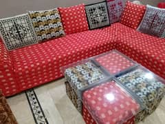 7 seater L Shaped sofa with center table 4 Stool.