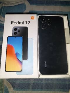 Redmi 12 full box 8 128 location jaranwala city only call O3O34O88469