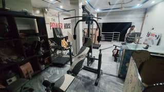 Imported multi gym home station with bench press lat pull down chest