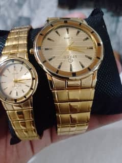 Mens and women's watch pair