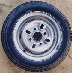Suzuki mehran nearly new tyre with rim