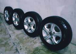 Suzuki mehran 4 new tyres with alloys