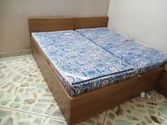 Two single bed with mattress and one sight table