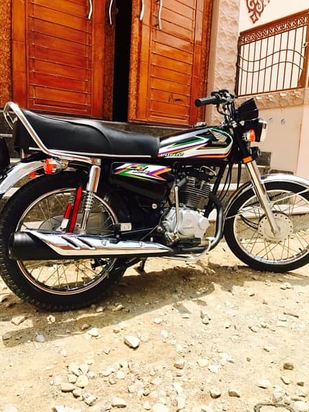 Honda CG 125 karachi number sealed engine 5