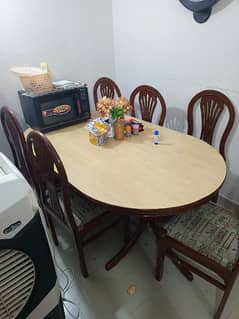 orignal tek dinning table with 6 chairs